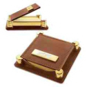 Leather notepad with brass accents and self-adhering 3" x 3" note pad.